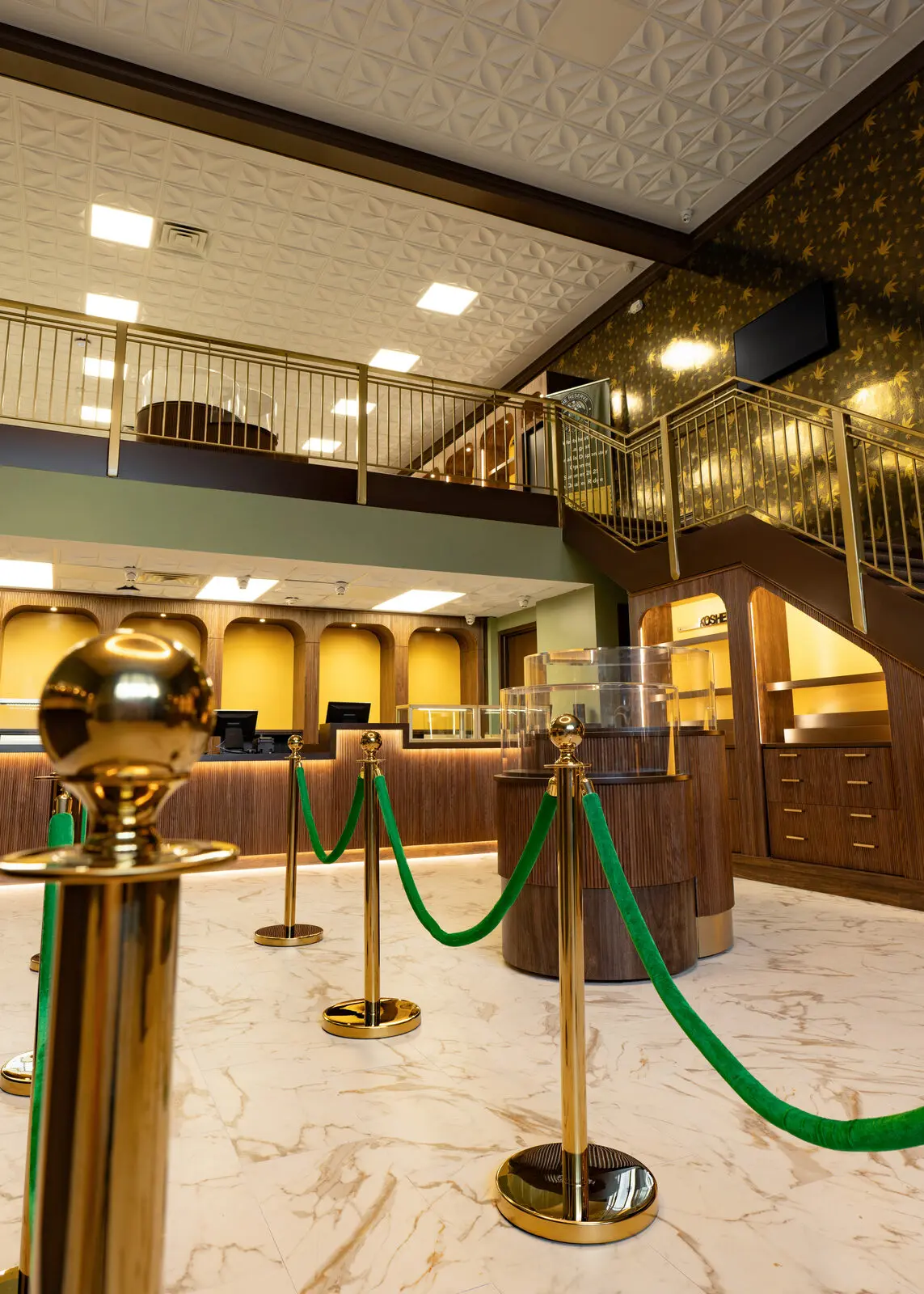 The Reserve interior — marble, brass, velvet ropes